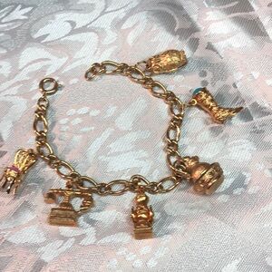 Vintage Avon charm bracelet, gold tone, our coffee grinder shoe Victorian boot